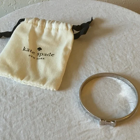 Kate Spade: Silver Tone Bow Bracelet- Marks - Picture 4 of 16
